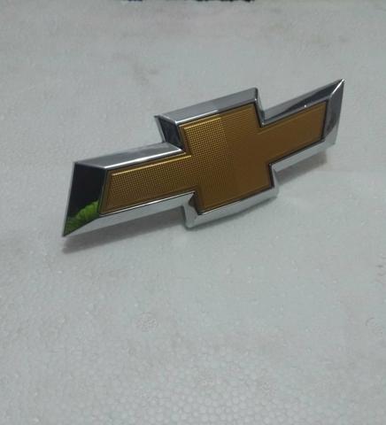 Emblema gravata dourada Chevrolet - Foto 4