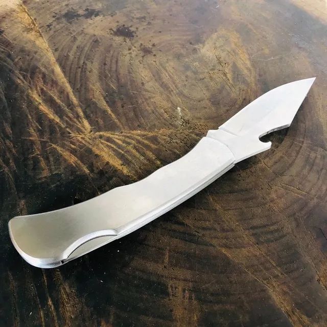 Canivete Aço inox com trava e clip de bolso e Abridor de Garrafa. - Foto 5