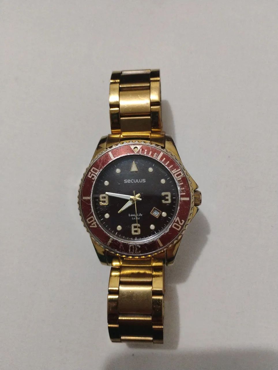Relógio Seculus Dourado - Elegância e Estilo