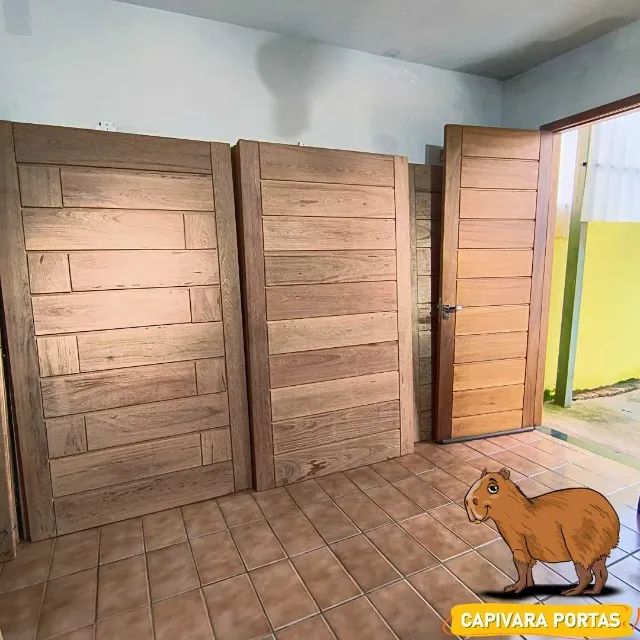 Porta Pivotante de Madeira Maciça Modelo BBB Cedro ou Angelim Pedra - Foto 2