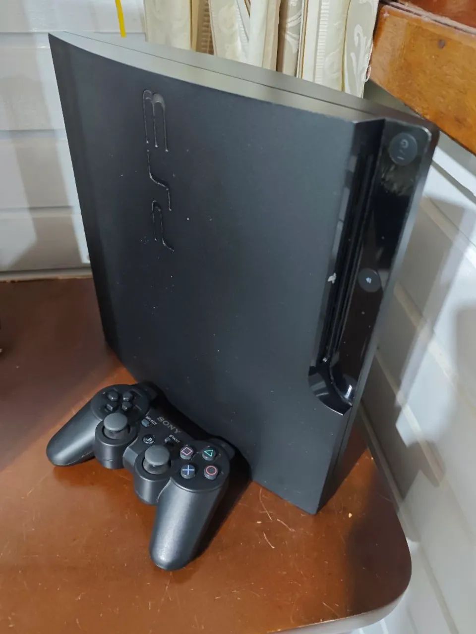 PS3 slim só pegar e jogar vários jogos no hd