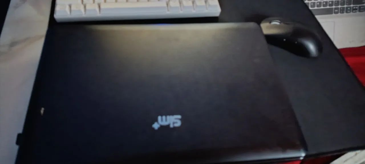 Notebook positivo semi novo, 450 com carregador e troco com celular 