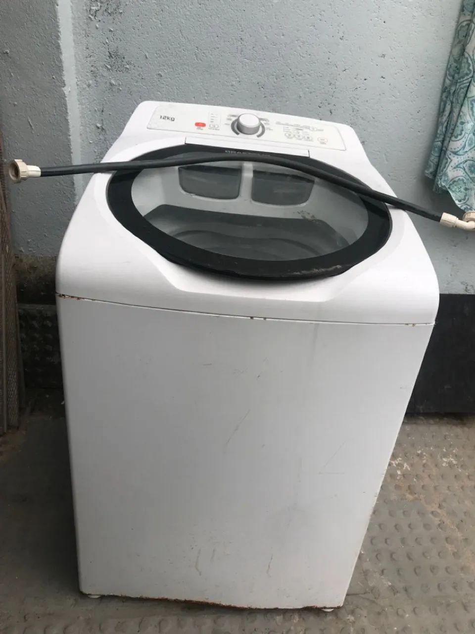Máquina de lavar com defeito 