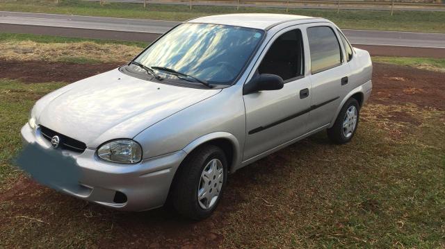 Corsa Sedan 1.0 à alcool aceito troca por moto - Foto 8