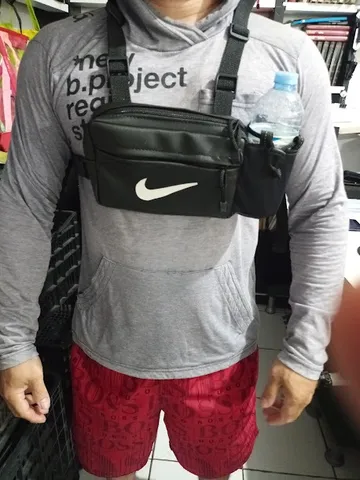 bolsa de peito com suporte para garrafa e varios bolsos