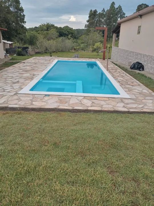 Ana: Piscina de 7,5 metros com spa com hidromassagem 