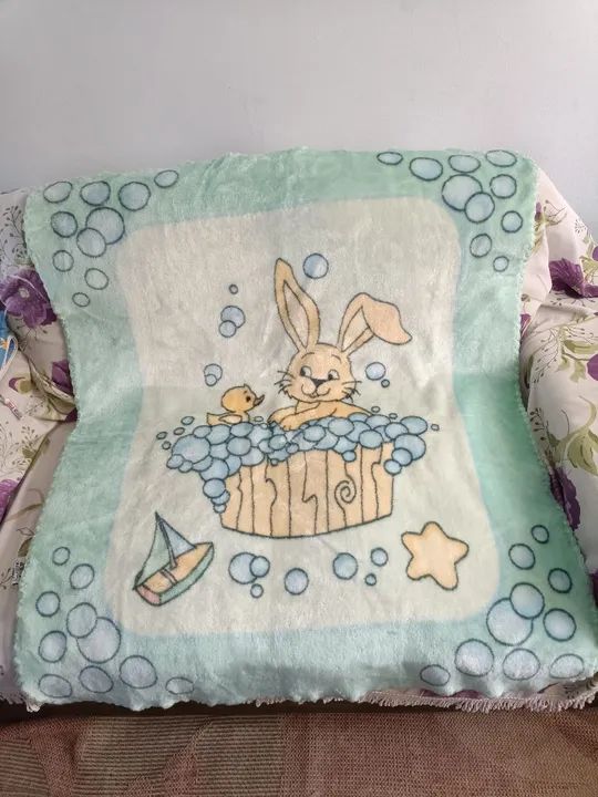 Cobertor de bebê com tema de banho.