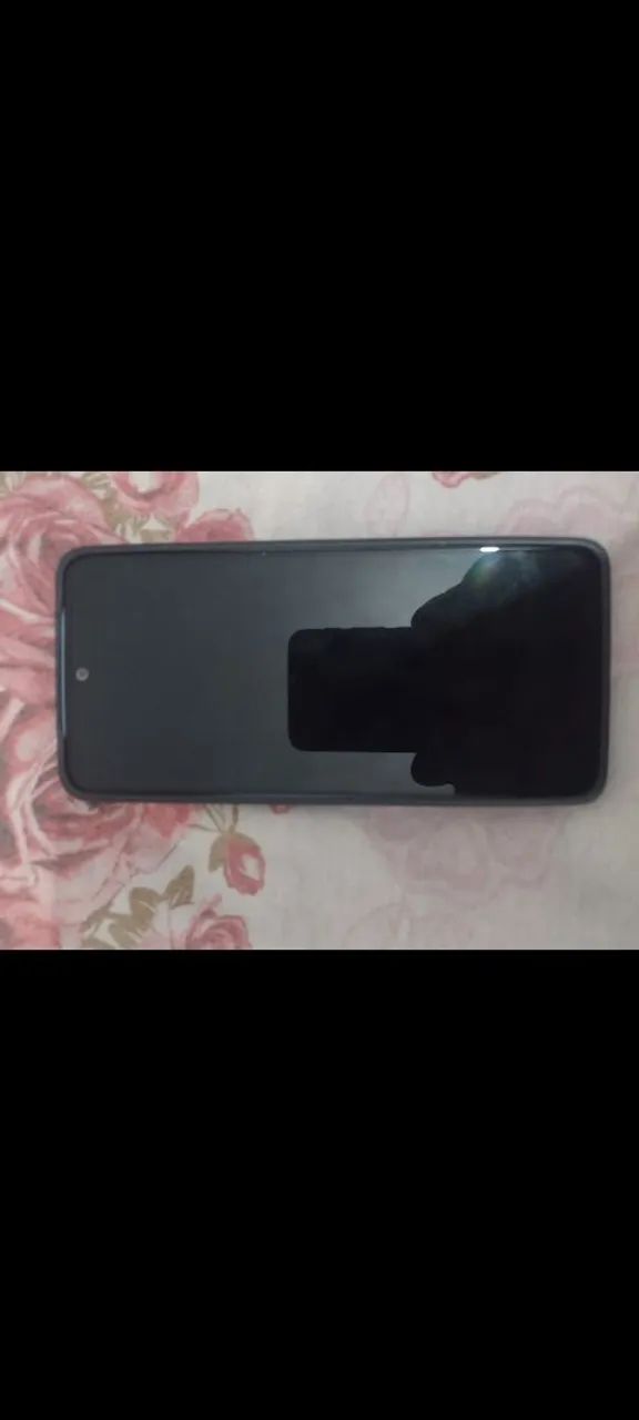 Redmi note 13 com nota fiscal e carregador. 