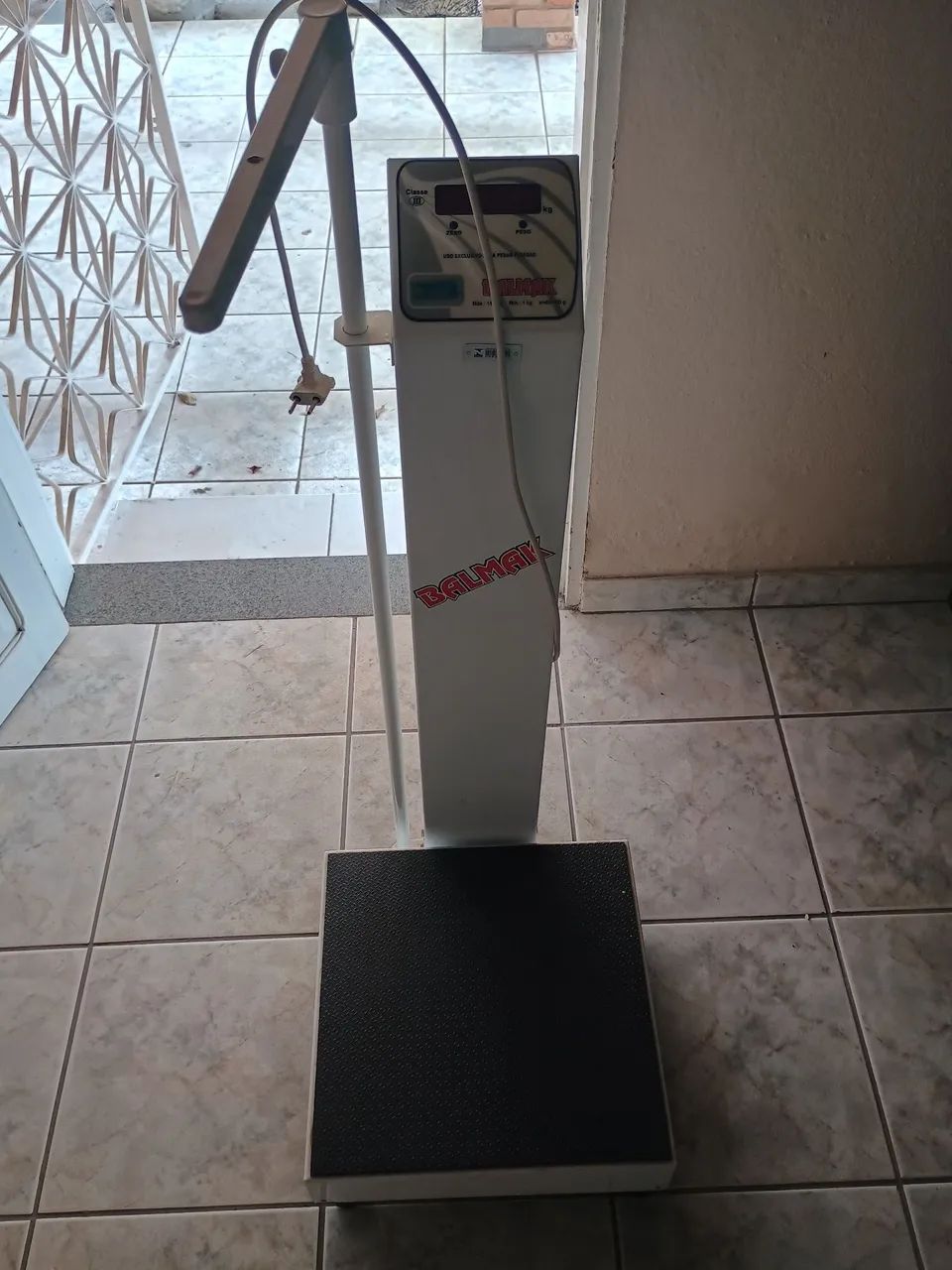 Balança e medidor de tamanho 