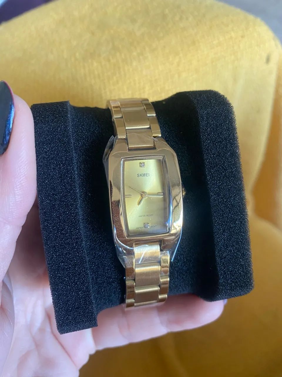 Relógio feminino dourado 
