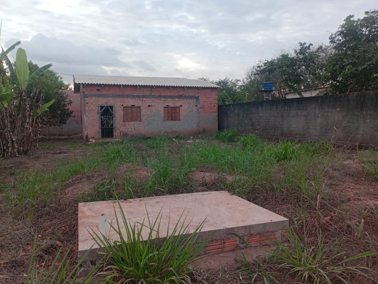 Vendo terreno com construção 