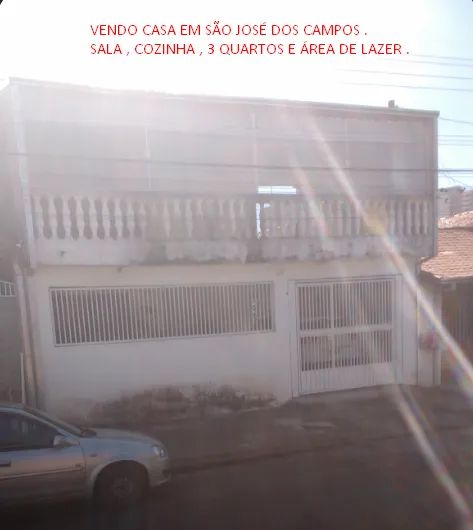 Casa com Edicula  e Área de lazer .