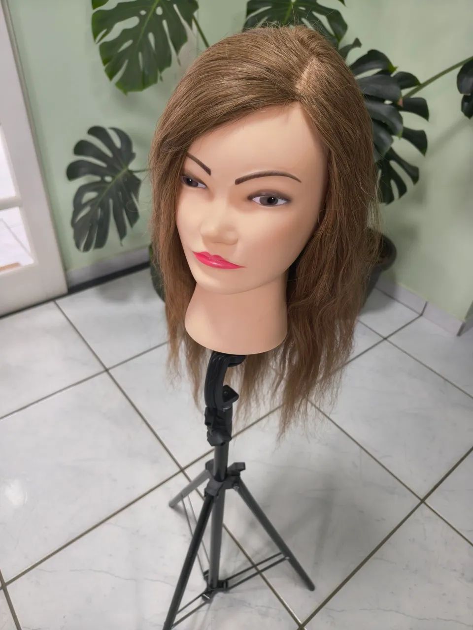 Cabeça de boneca para treino 