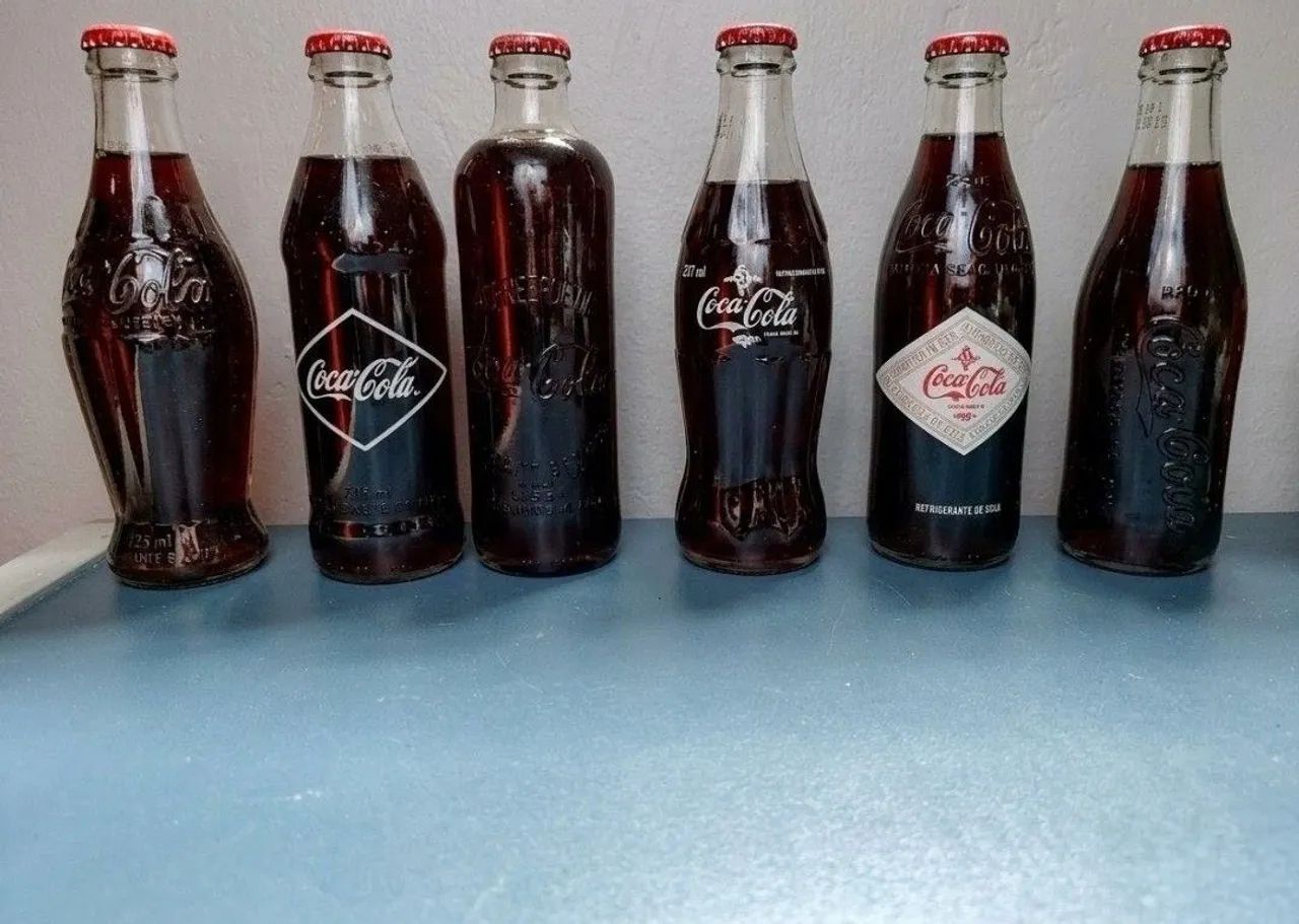Lote de coloção limitada de evolução da coca cola
