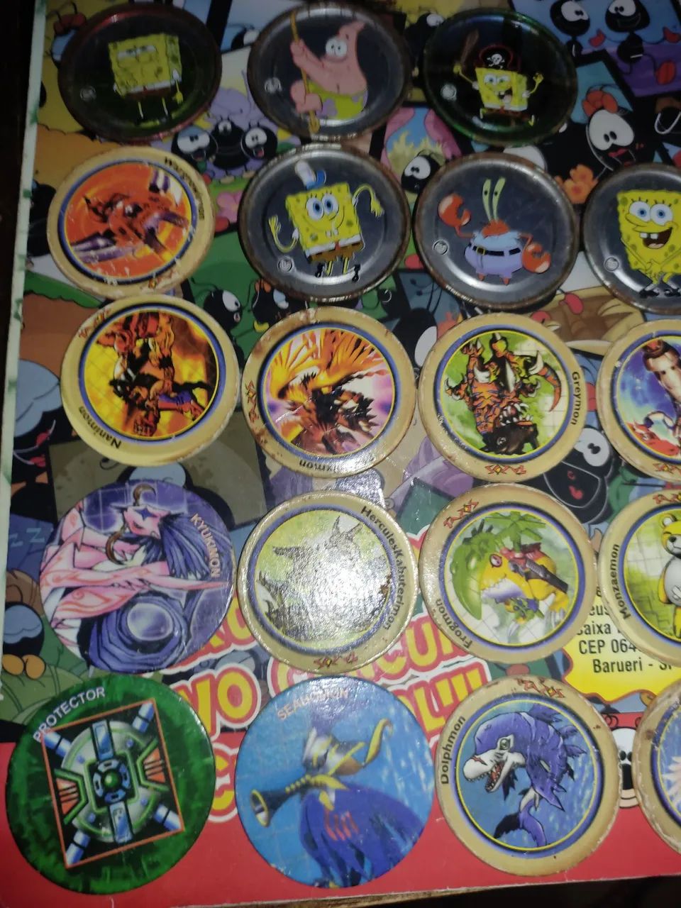 23 Tazos of SpongeBob and Digimon *