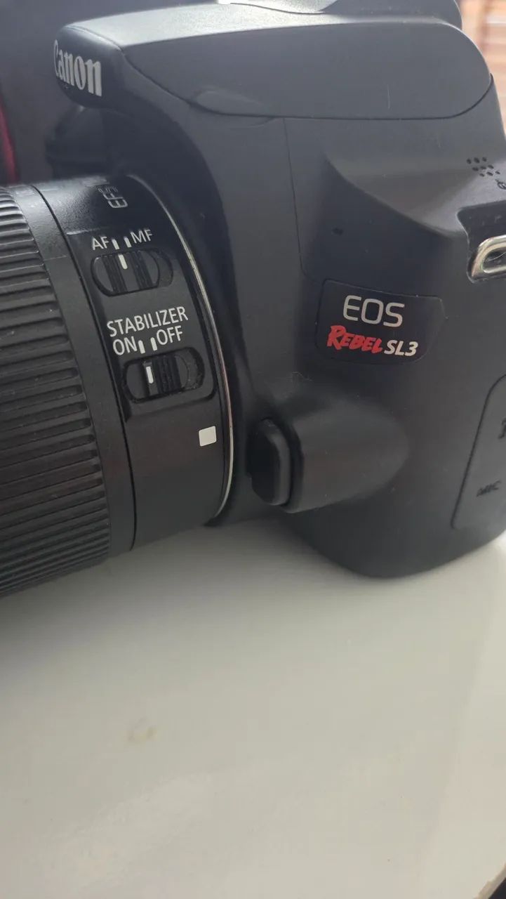 Canon EOS Rebel Sl3 - Seminova + Lente 18-55mm + 2 baterias + Microfone Boya + Gaiola  - Foto 4
