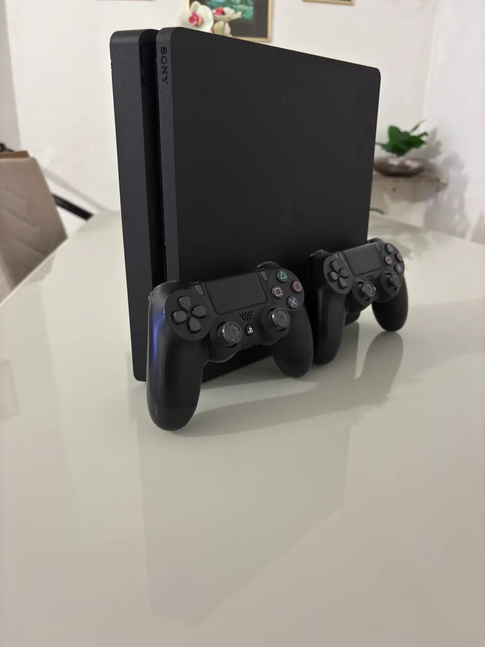 Vendo ps4 slim de 1 tera de armazenamento impecável  - Foto 2