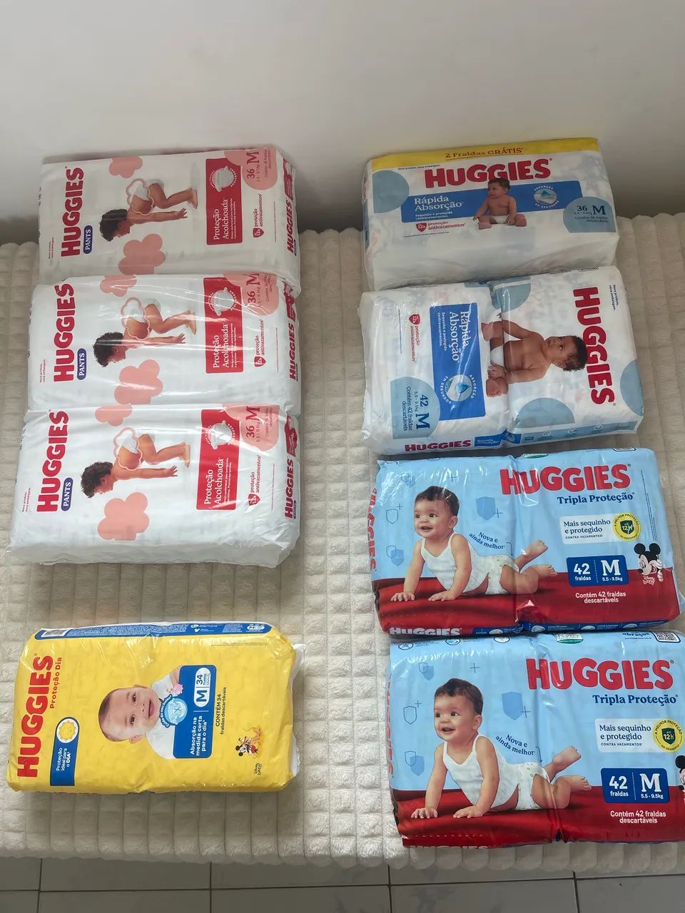 Fralda Huggies M média 