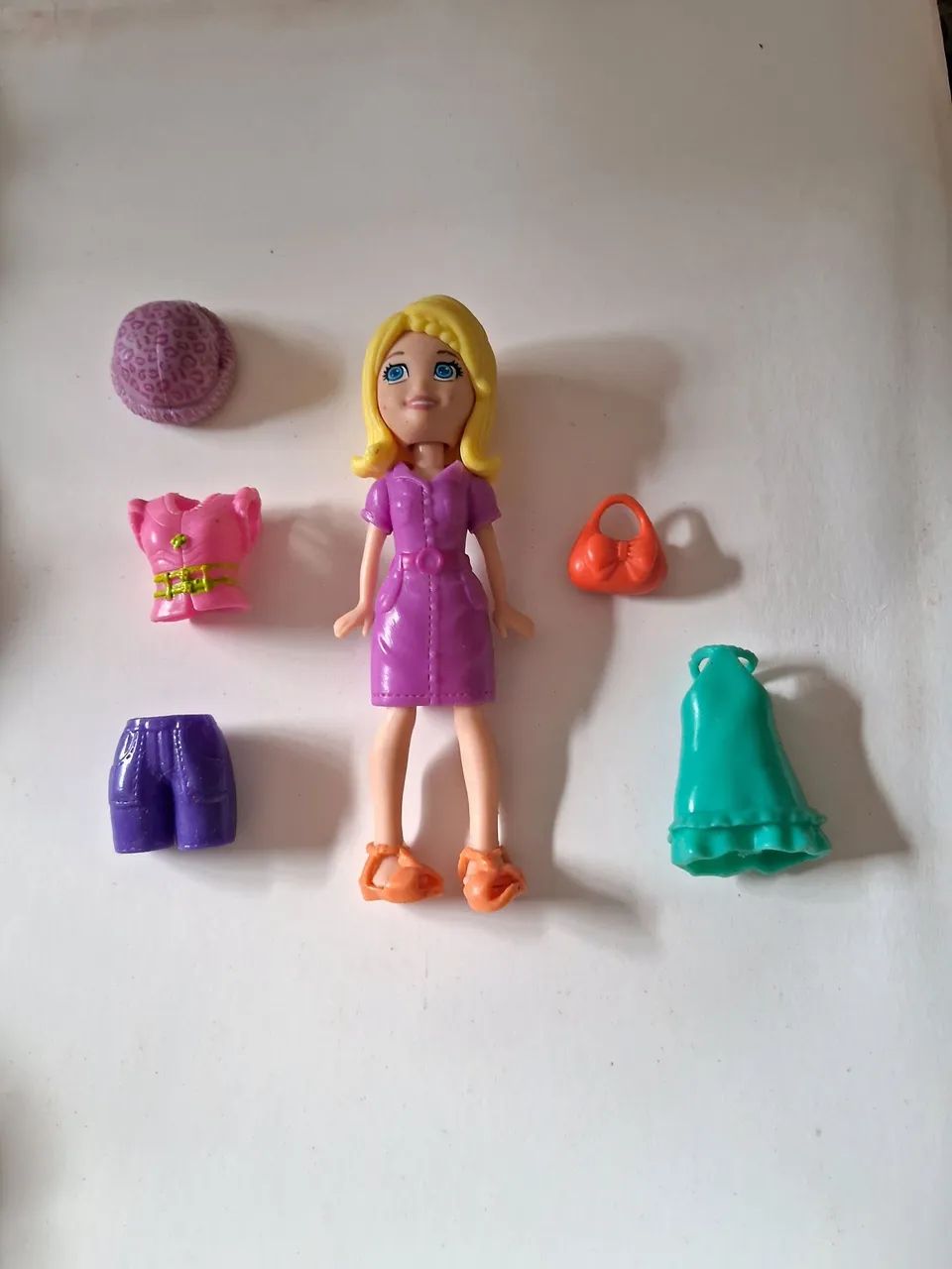 Boneca Polly e acessórios $15