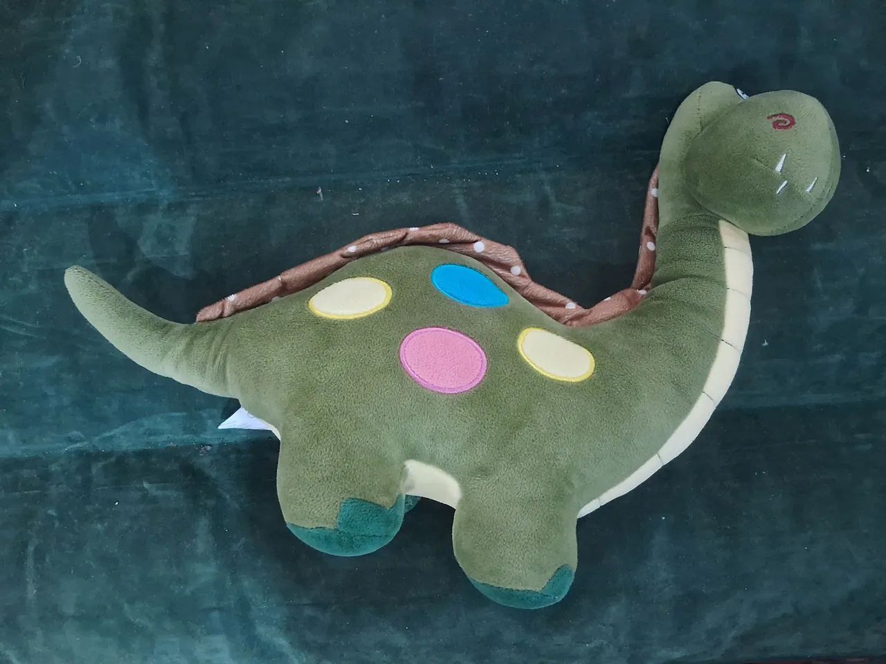 Dinossauro de pelúcia verde