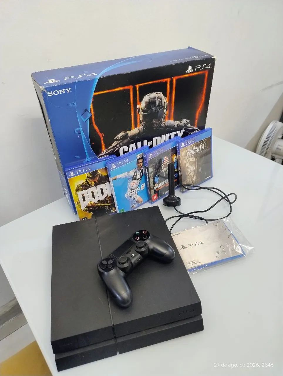 Ps4 com caixa + 4 jogos 