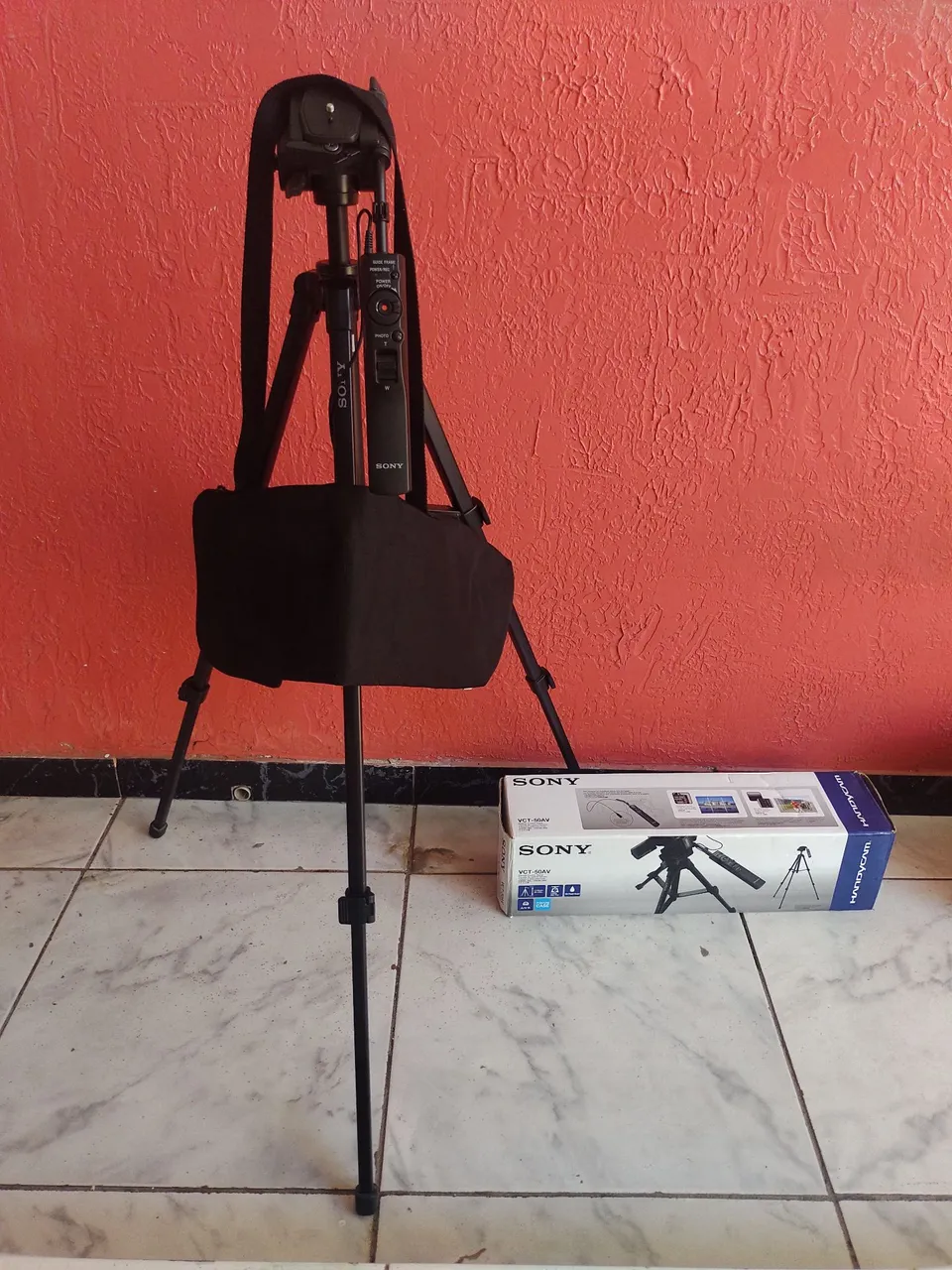 Tripé para câmera e Chuveiro elétrico