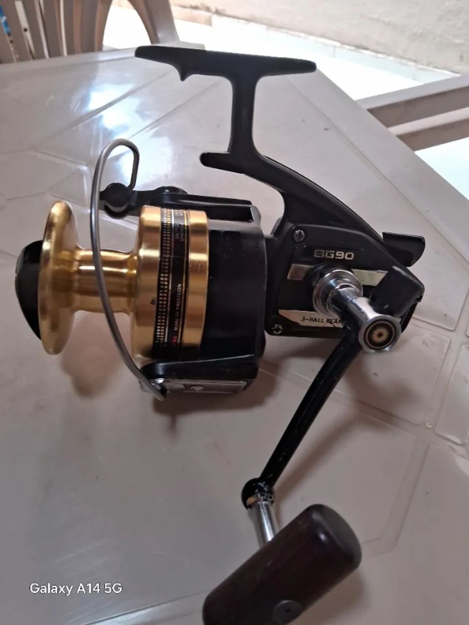 Molinete daiwa bg 90 serie ouro - Foto 3