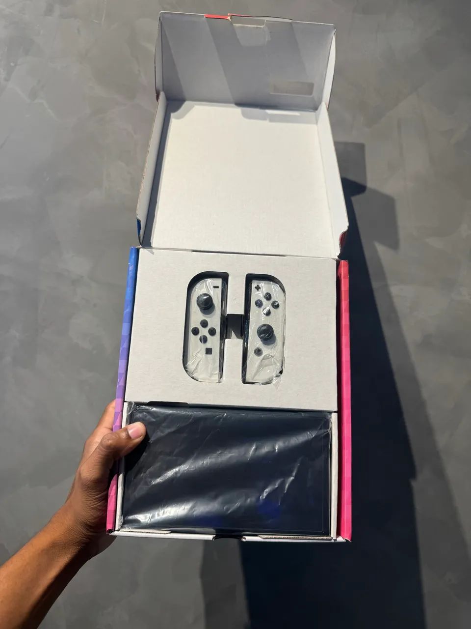 Nitendo switch oled com caixa e todos acessórios 