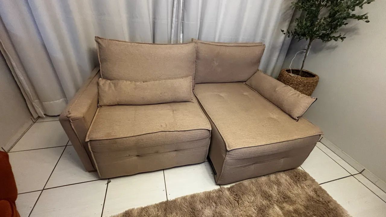 Sofá retrátil em linho bege 1,000