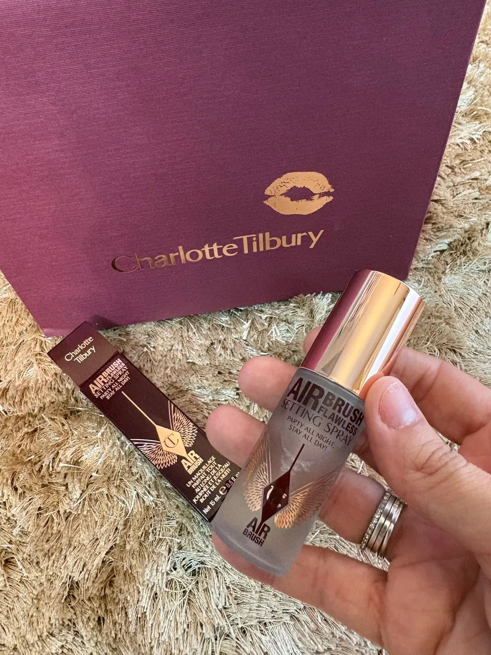 Fixador Charlotte Tilbury com sacola 