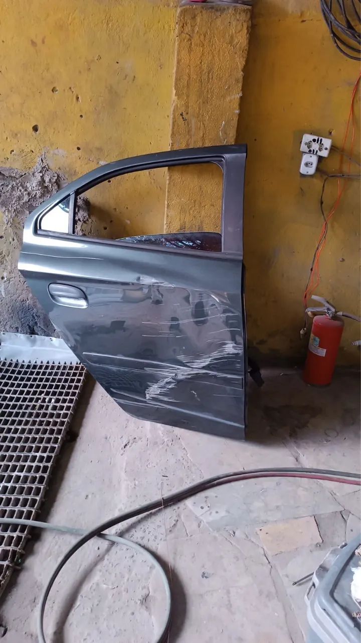 Porta prisma lado direito( passageiro)