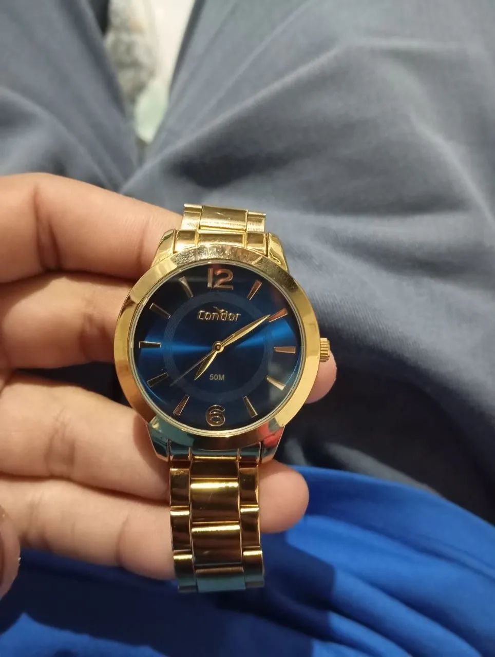 Relógio condor dourado
