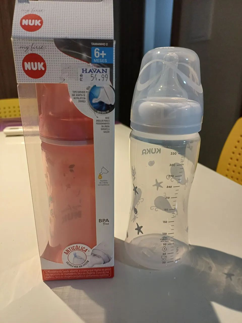 02 Mamadeiras seminovas de 330ml: uma Nuk my first e outra Kuka.