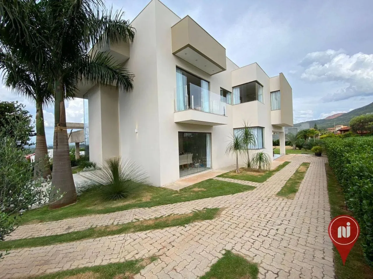 Casa com 5 dormitórios à venda, 380 m² por R$ 1.700.000,00 - Condomínio Serra dos Bandeira