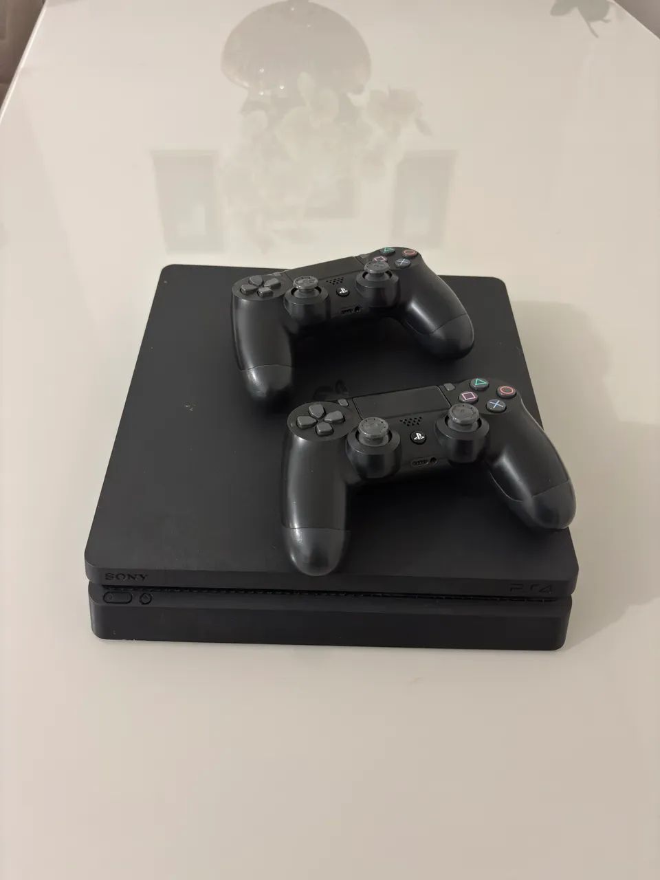 Vendo ps4 slim de 1 tera de armazenamento impecável  - Foto 3