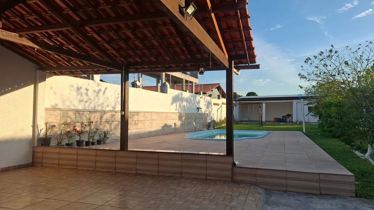 ALUGO CASA 3/4 COM DUAS SUÍTES 