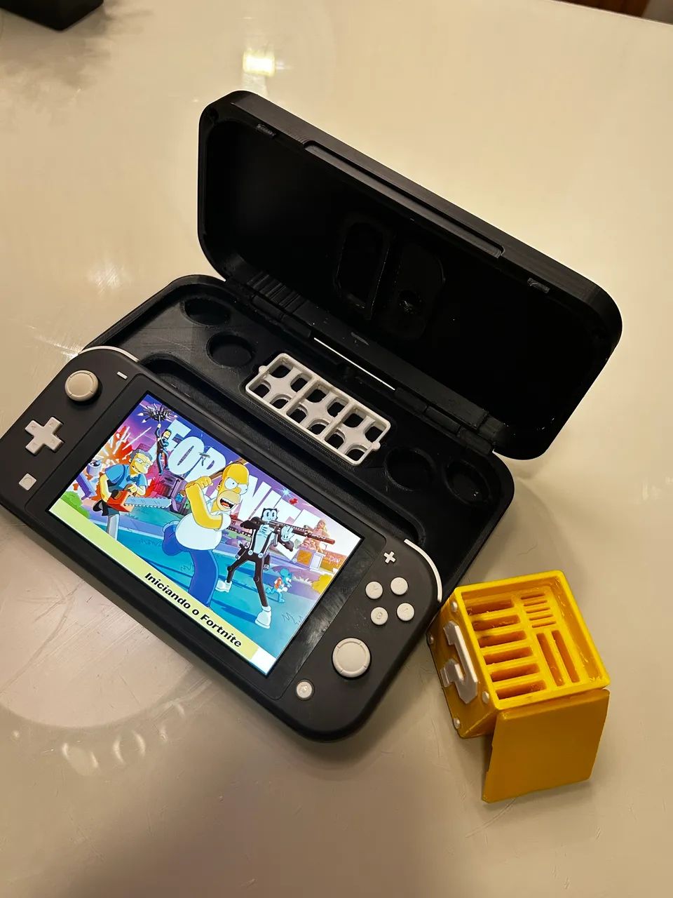 Nintendo Switch Lite + case e porta cartucho  - Foto 2