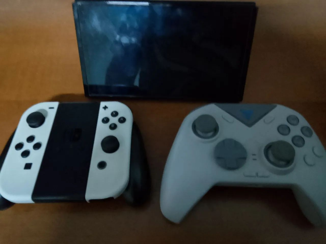 Nintendo switch OLED com pro controller e FIFA 20 mídia fisica 