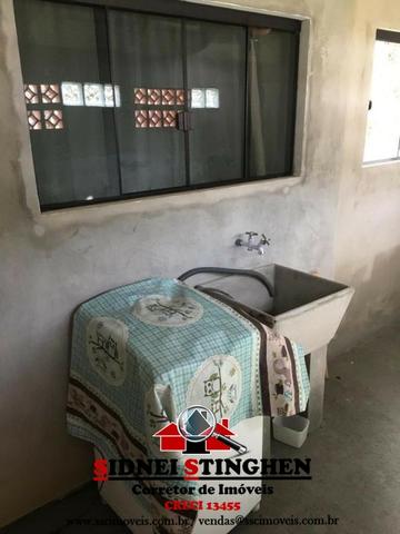 Casa na Praia, 02 dormitórios, laje, piso cerãmico e terreno todo murado - Foto 14