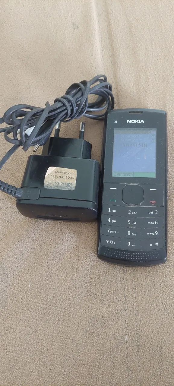 Celular Nokia X1-01 FUNCIONANDO PERFEITAMENTE COM CARREGADOR ORIGINAL ANTIGO ANTIGUIDADE  - Foto 2