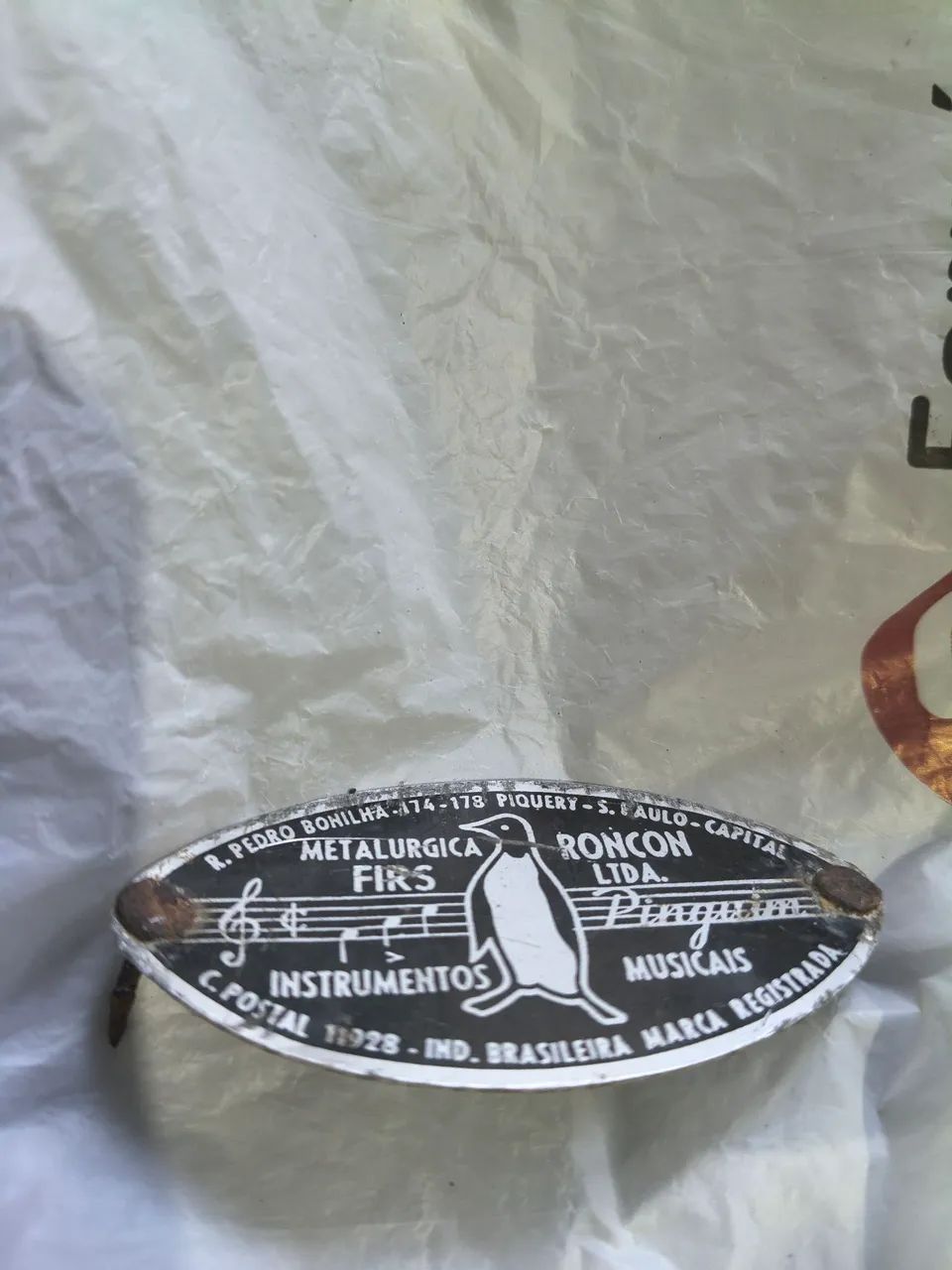 Plaquinha da bateria pinguim 
