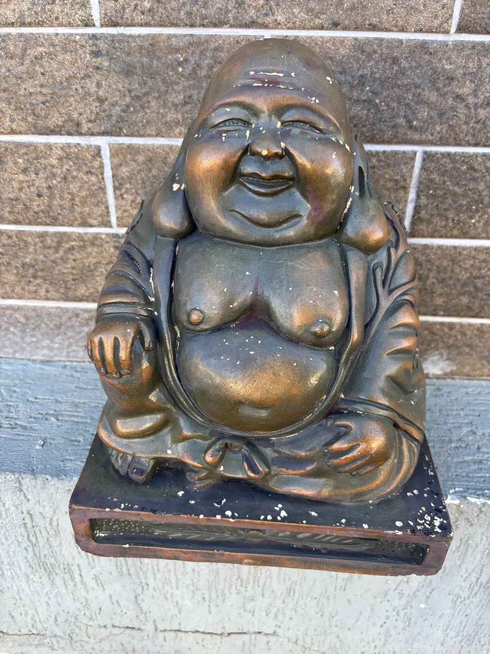 Buda antigo de gesso
