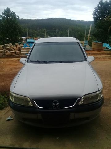 Vendo vectra 99/ aceito troca por celta - Foto 4