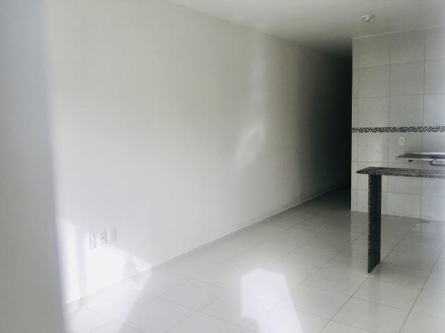 Documentação Inclusa: 2 quartos, 2 wcs, garagem, sala, coz americana, quintal, área serviç - Foto 5