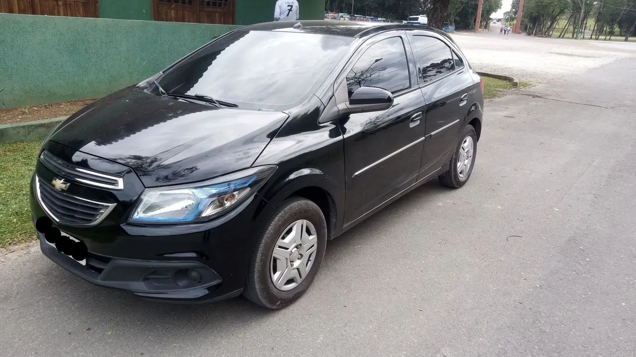Onix lt 10 8v completo 130.000 km em ótimo estado de conservação.
