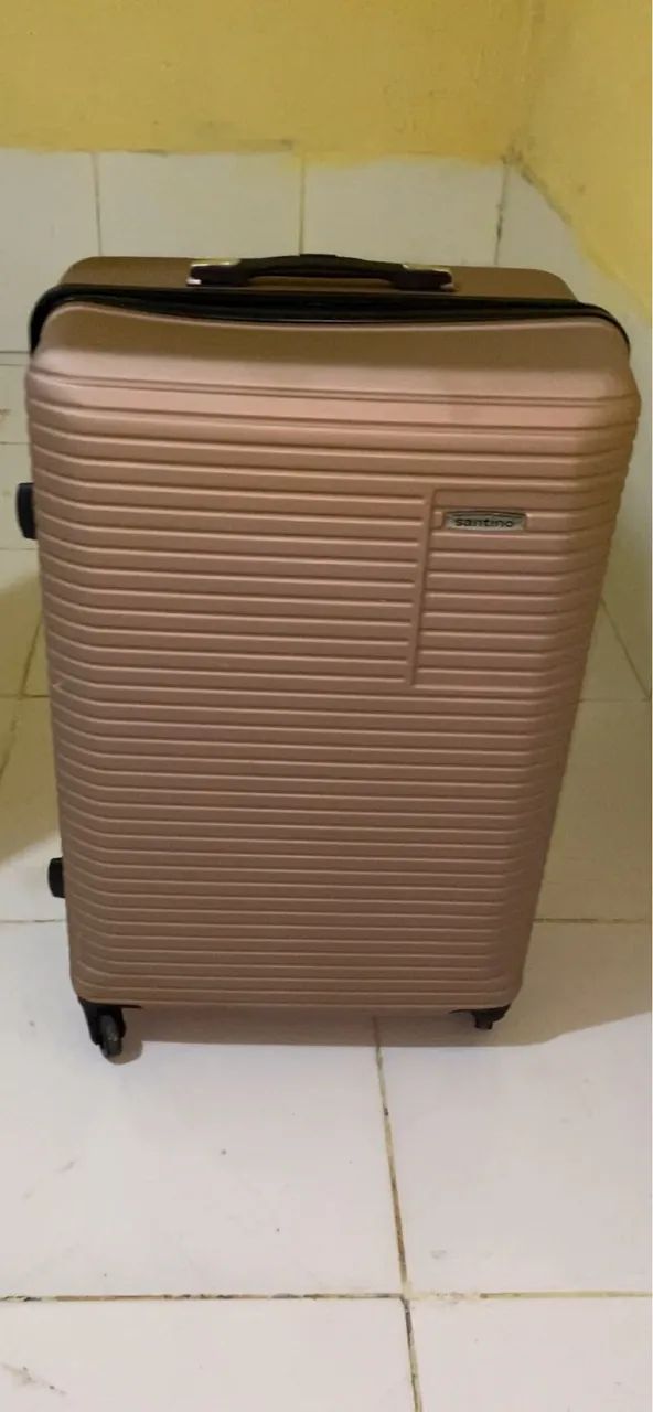 Mala de viagem rosa cobre