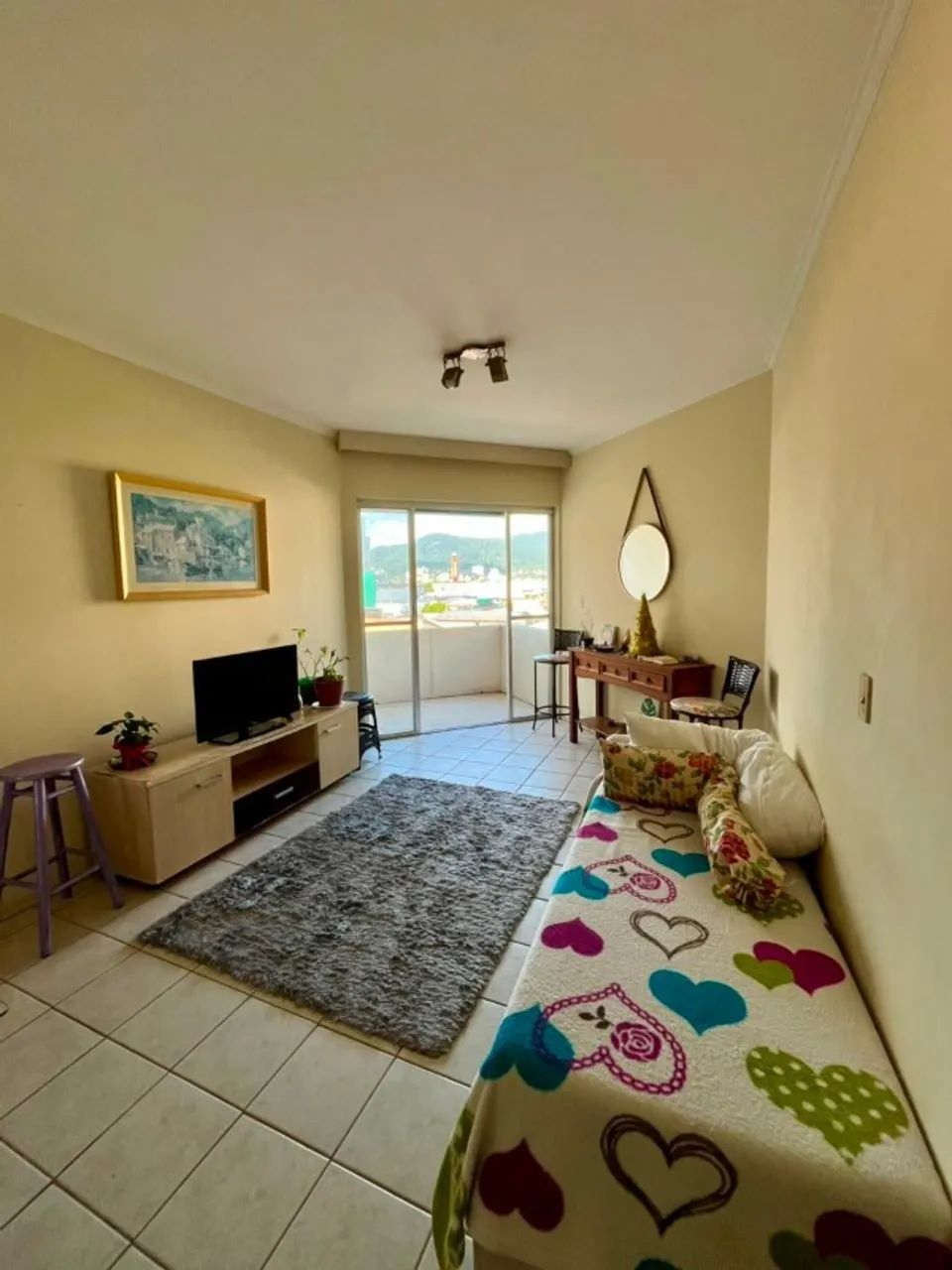 Quarto feminino em apartamento compartilhado