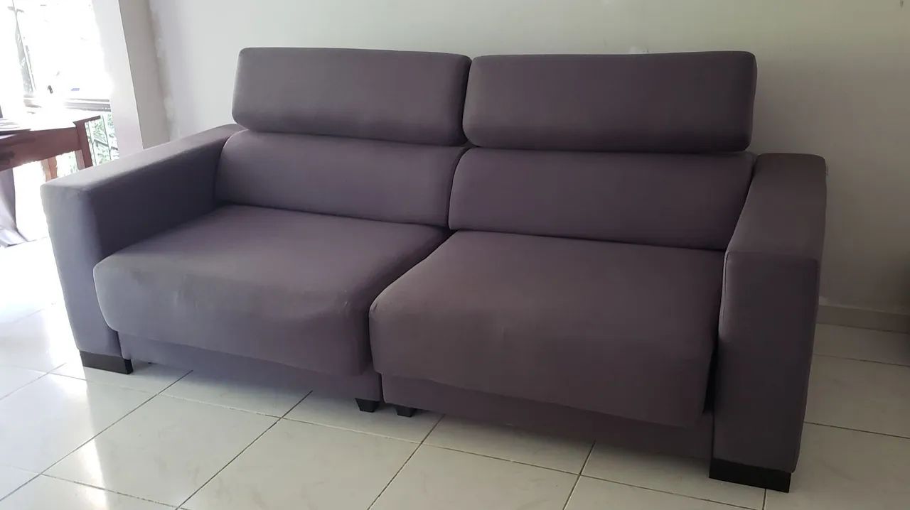 Sofá-cama elegante semi-novo 