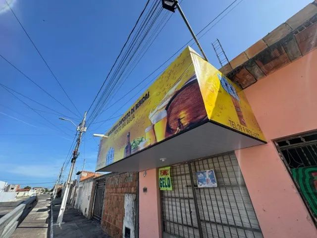 Fachada em ACM e em lona 