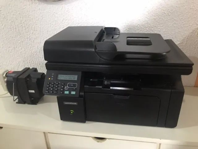 Impressora Multifuncional HP LaserJet M1212nf Laser